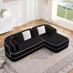 Divano componibile a L in tessuto teddy nero / cammello / verde / bianco – 3 posti