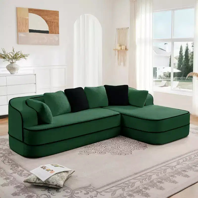 Divano componibile a L in tessuto teddy nero / cammello / verde / bianco – 3 posti