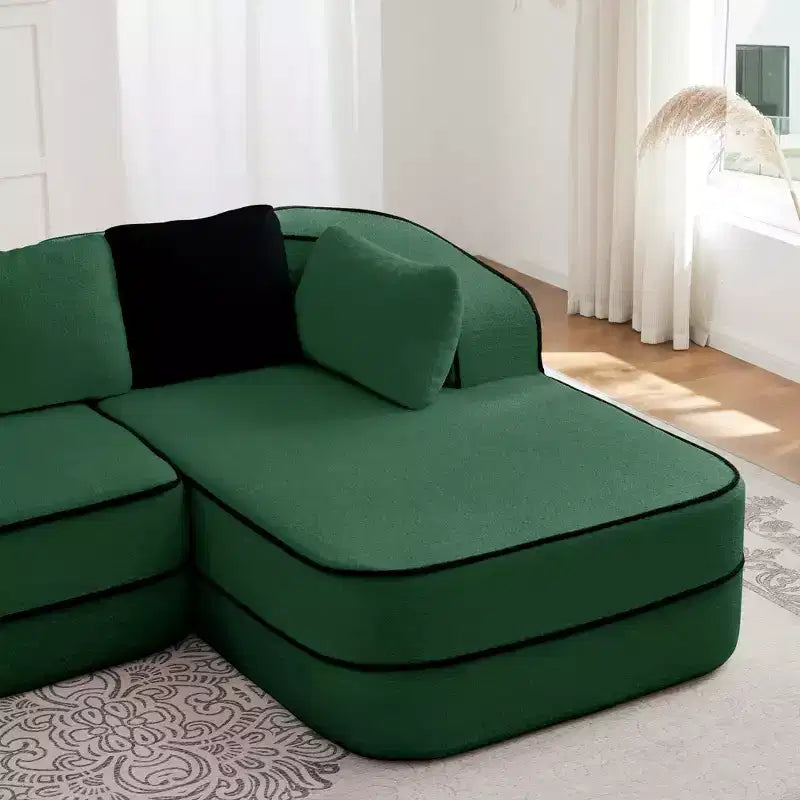 Divano componibile a L in tessuto teddy nero / cammello / verde / bianco – 3 posti