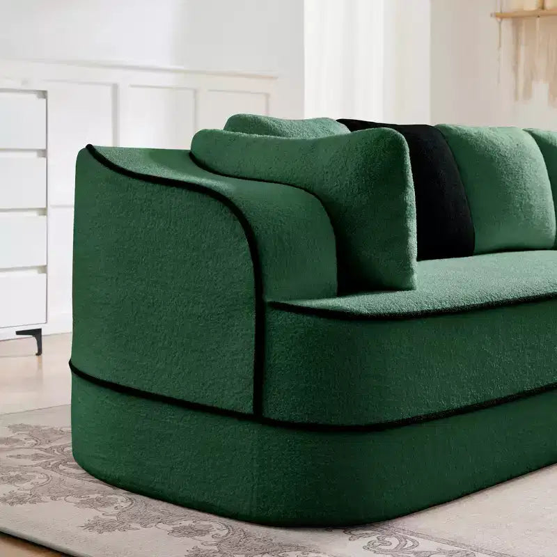 Divano componibile a L in tessuto teddy nero / cammello / verde / bianco – 3 posti
