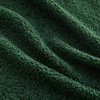 Divano componibile a L in tessuto teddy nero / cammello / verde / bianco – 3 posti