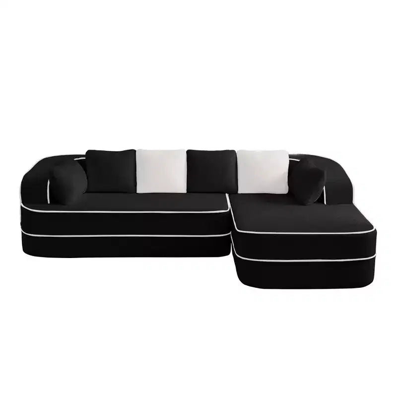 Divano componibile a L in tessuto teddy nero / cammello / verde / bianco – 3 posti