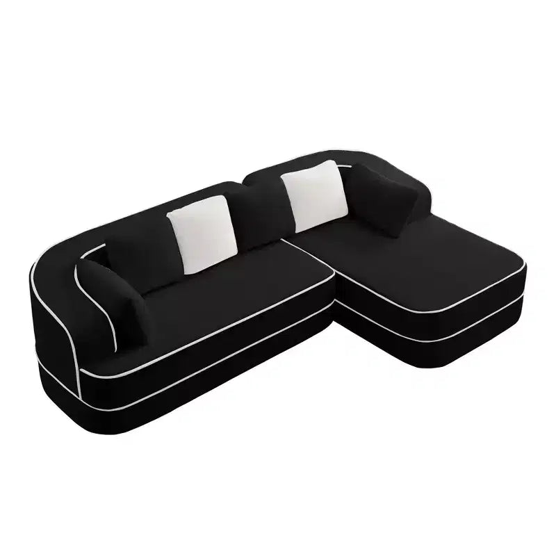 Divano componibile a L in tessuto teddy nero / cammello / verde / bianco – 3 posti